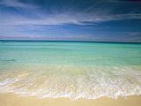 Collection - Clear Blue Water And Wispy Clouds Along The Beach at Cancun painting