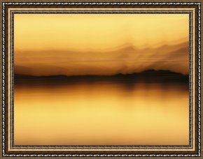 Night View of a Barge And It's Tug on The Kanawha River Framed Paintings - A Blurred View of Spruce Trees Along The Mackenzie River at Sunset by Raymond Gehman