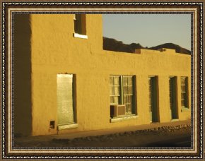 Exterior Framed Paintings - Adobe Building Exterior at Sunset by Raymond Gehman