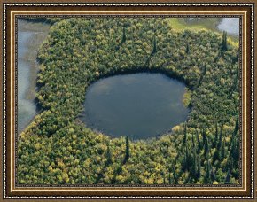 Night View of a Barge And It's Tug on The Kanawha River Framed Paintings - An Aerial View of The Mackenzie River Delta by Raymond Gehman