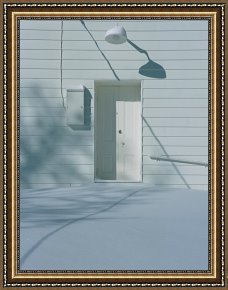 Raymond Gehman Framed Prints - Snow Blends in with The Doorway of a White Building by Raymond Gehman