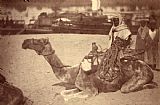 Despoineta Camel with Native Men on The Bank of The Nile