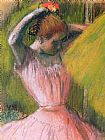 Edgar Degas Dancer arranging her hair