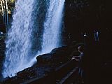 Raymond Gehman Hikers Walking Behind Scenic Dry Falls at The Base