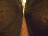 Arch Prints - Trail Through a Narrow Cleft in a 65 Foot High Sandstone Arch by Raymond Gehman