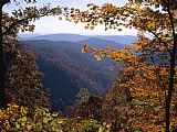 Raymond Gehman A Blue Ridge Mountain Escarpment Framed by Maple Trees in Autumn Hues