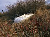 Raymond Gehman A Boat Rests Upside Down on The Shore of The Mackenzie River