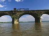 Arch Prints - A Train Crosses The Rockville Bridge c.1902 The Longest Stone Arch Railroad Bridge in The World by Raymond Gehman