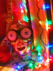 Raymond Gehman Mask And Christmas Lights in a Costume Shop Window in San Francisco