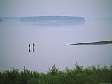 Raymond Gehman Mist Rises From The Mackenzie River As Two People Go Wading