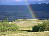 Raymond Gehman Rainbow Touches Down on a Plain After an Evening Rainstorm