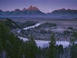 Raymond Gehman The Moon Bows to The Sun As First Light Strikes The Teton Range