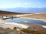 Walking The Plank Prints - Tourists Walking on Badwater Basin in Death Valley National Park Ca by Raymond Gehman