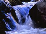Raymond Gehman Water Cascading Over Stones in a Gentle Small Waterfall