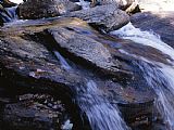 Raymond Gehman Water Cascading Over Stones in The Whitewater River