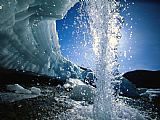 Raymond Gehman Water Splashes Over a Sheet of Ice on Wolf Creek