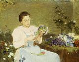 Victor Gabriel Gilbert Arranging Flowers For A Spring Bouquet
